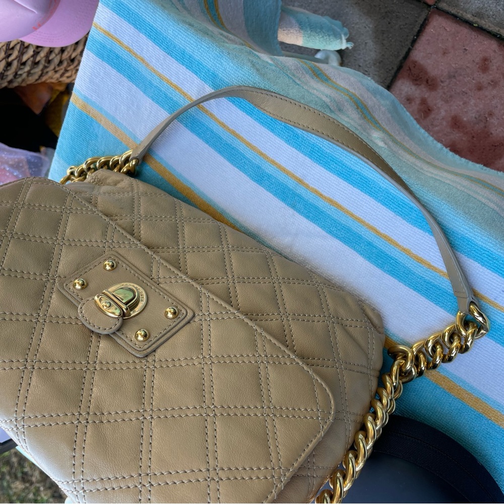 Marc Jacobs bag. In good condition with dust bag. Clean, no tears or stain.